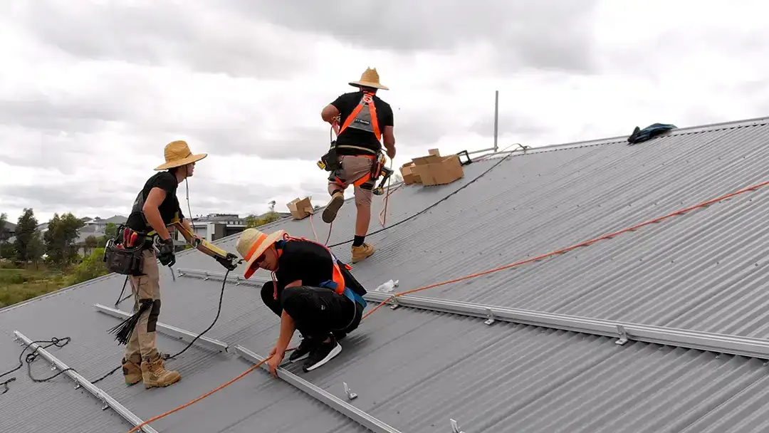 drone-shot-workers-on-roof1 copy