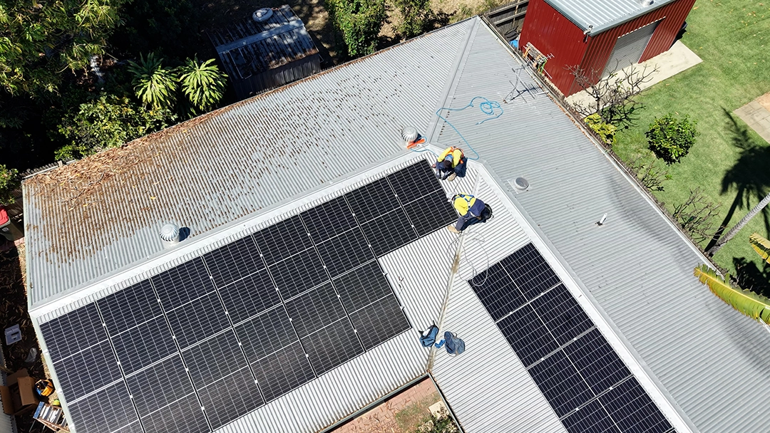 Aerial photo of True North Solar installation team mounting solar panels on the roof