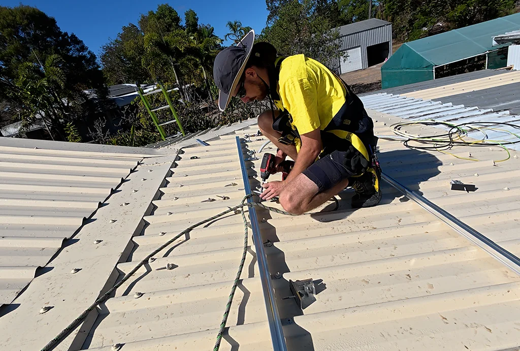 true-north-solar-installing-racking-on-roof
