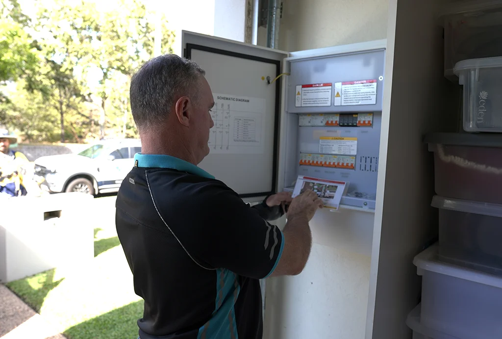 Kash from True North Solar inspecting a Sigenergy Gateway