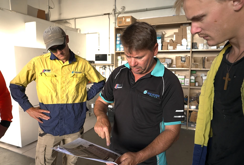 true-north-solar-team-reviewing-commercial-install-plans